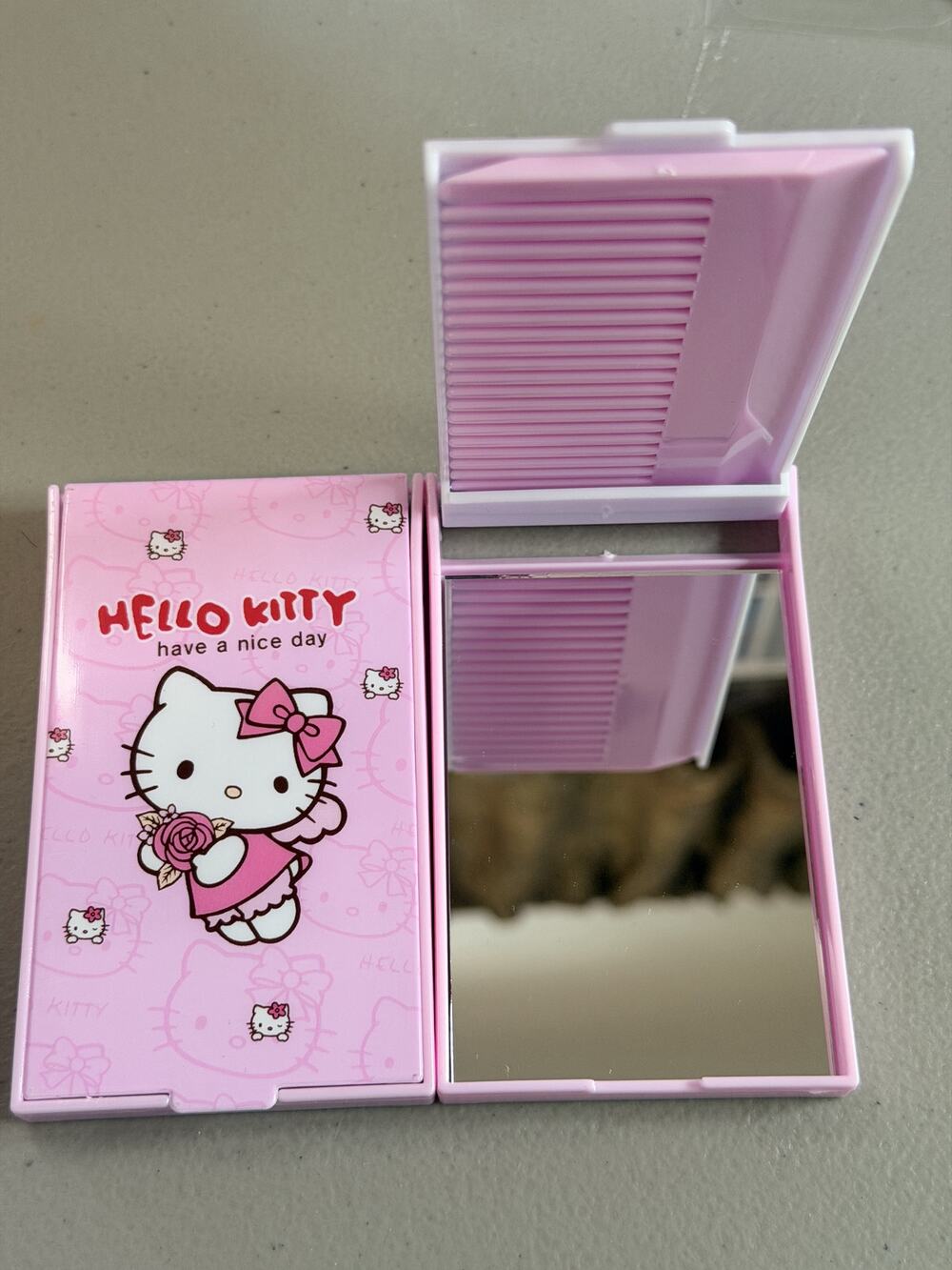 #HK-693 Hello Kitty Pocket Mirror & Comb Set